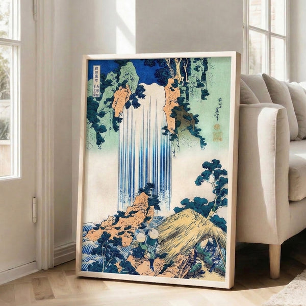 Traditional Japanese woodblock composition of Yoro Waterfall framed as a poster, depicting cascading water through a dramatic mountainous landscape in muted blues and earth tones.