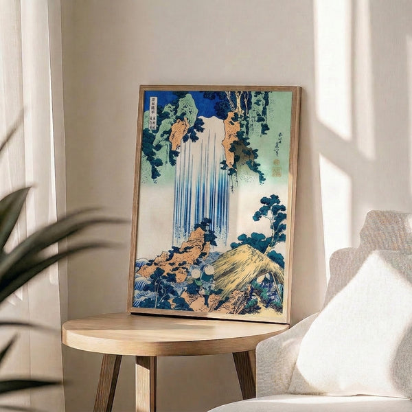 Hokusai-inspired waterfall scene rendered in classic woodblock technique with serene forest surroundings, rocky outcrops, and a sophisticated palette of deep indigo, cream, and sage green.