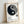 Wabi sabi inspired framed poster featuring a gestural black brushstroke forming a yin yang symbol against cream background.