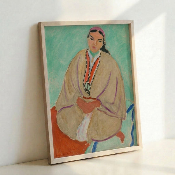 Framed Matisse portrait art print with vibrant yellow palette and flowing, abstract figure rendered in warm colors.