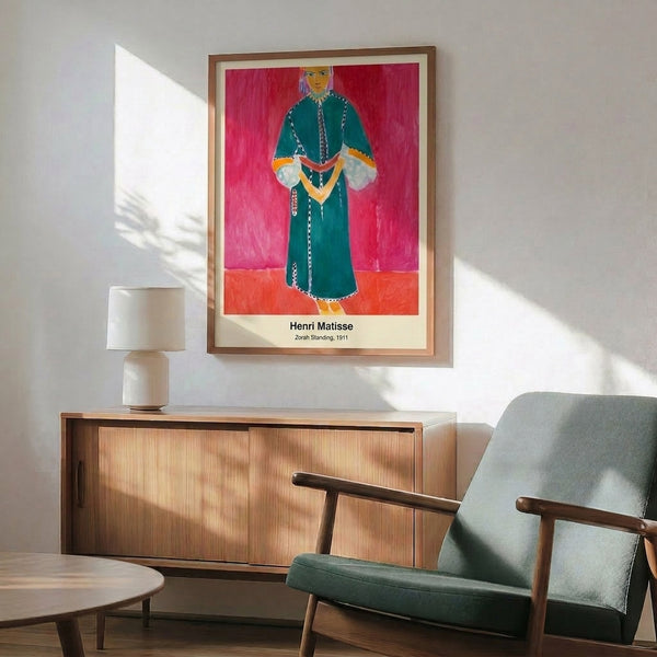Framed faceless portrait of a woman in warm ochre and terracotta tones set against deep blue, reflecting contemplative and culturally layered artistic vision.